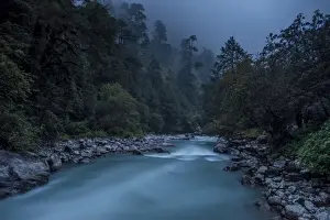 Langtang Khola near the little village of Riverside on a misty evening in the Langtang
