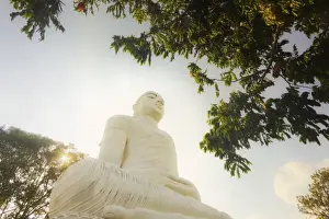 Kandy Prints: The large 27m Buddha statue at Sri Maha Bodhi Viharaya temple on Bahirawakanda Hill overlooking the city