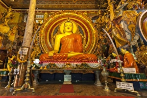 Large Buddhist statue at Gangaramaya Temple, Colombo, Sri Lanka, Asia