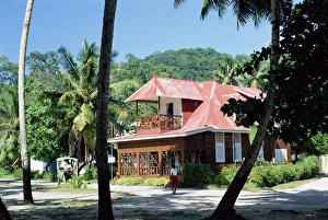 La Digue Prints: Large house in village