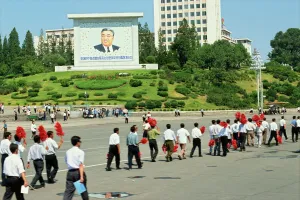 North Korea Prints: Large picture of Great Lerader and car-less people walking, Pyongyang, North Korea, Asia
