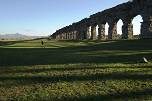 Unrecognisable Person Prints: One of the largest Aqueducts in Rome built in the year 38 BC, Rome, Lazio, Italy, Europe