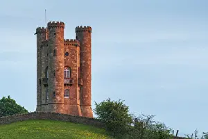 Cotswolds Prints: Late evening sunlight on Broadway Tower in the Cotswolds in spring, Gloucestershire