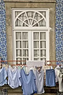 Images Dated 4th October 2009: Laundry hanging from window in the Ribeira Quarter, Oporto, Portugal, Europe