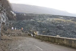 Lava flow after the eruption of the Piton de la Fournaise destroyed the Road RN 2 Lava flow after the eruption of the Piton de la Fournaise destroyed the Road RN 2
