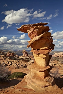 Stack Prints: Layered sandstone column under clouds