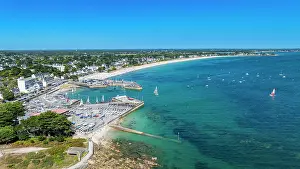 Land Prints: Legenese cove beach aerial view shows boats