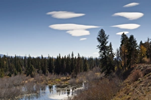 Lenticular clouds over Moose Pond, autumn, Grand Teton National Park, Wyoming, United States of America, North America