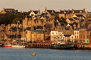 Townscape Prints: Lerwick, from the sea, waterfront sandstone buildings and golden early morning