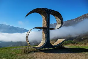 Terrain Prints: Letter monument stands in mountains near Verkhny Fiagdon