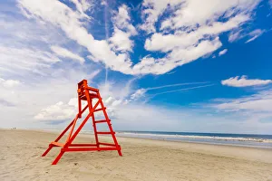 Empty lifeguard chair on empty Jacksonville beach during closing hours during Covid-19 Empty lifeguard chair on empty Jacksonville beach during closing hours during Covid-19