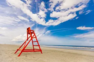 Absence Prints: Empty lifeguard chair on empty Jacksonville beach during closing hours during Covid-19