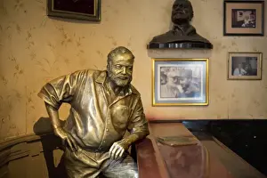 Literature Prints: Lifesize bronze of the late author Ernest Hemingway at the bar of El Floridita