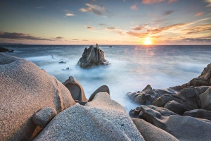 Province Of Sassari Prints: The light of sunset on blue sea framed by cliffs, Capo Testa, Santa Teresa di Gallura