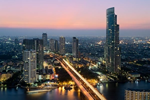 Typically Thai Prints: Light trails and skyscrapers at dusk, Bangkok, Thailand, Southeast Asia, Asia