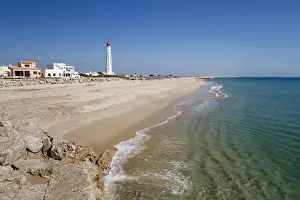 Algarve Prints: Lighthouse and beach of Ilha do Farol, Culatra barrier island, Olhao, Algarve, Portugal