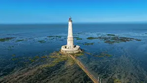 Navigation Prints: Lighthouse of Cordouan overlooks the sea and tidal flats during low tide in France