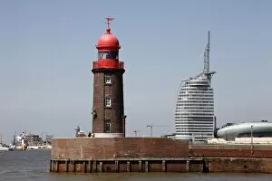 Images Dated 13th July 2010: Lighthouse at old harbour, and Atlantic Hotel Sail City, Bremerhaven, Bremen