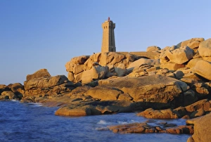 Cotes Darmor Prints: Lighthouse and pink granite rocks at sunset, Ploumanach, Cotes d Armor