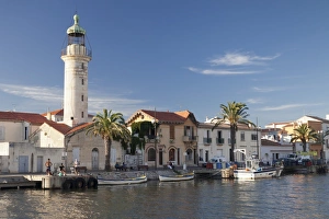 Southern France Prints: Lighthouse at the port, Petit Camargue