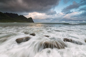 Vestvagoy Prints: Lights of midnight sun lights up the waves of the blue sea