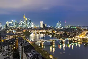 Hesse Prints: Lights of the Skyline of Frankfurt business district reflected in River Main at dusk