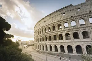 Ancient Rome Prints: The lights of sunrise frame the ancient Colosseum (Flavian Amphitheatre), UNESCO