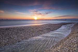 Marche Prints: The lights of sunrise reflected in the calm sea, Porto Recanati, Province of Macerata