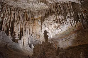 Limestone cave interior with many stalactites and stalagmites