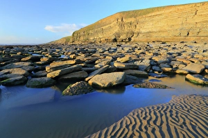 Tides Prints: Limestone cliffs and beach, Dunraven Bay