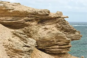 L Imestone Prints: Limestone outcrop showing classic cross bedding created by ancient dune sands
