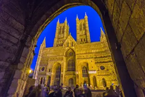 Lincoln Cathedral viewed through archway of Exchequer Gate at dusk, Lincoln, Lincolnshire