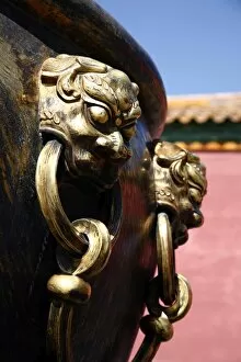Lion handle on a bronze urn at the Forbidden City, Beijing, China, Asia