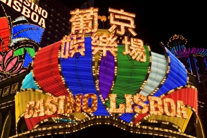 Lisboa Casino neon illuminated at night, Macau, China, Asia