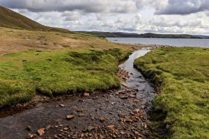 Little Ayre, burn, red sand and granite beach and rocks, Muckle Roe Island, Shetland