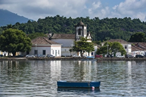 Paraty Prints: Little boat before a colonial church in Paraty