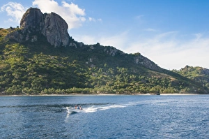 Motorboat Prints: Little motorboat cruising before, Naviti island, Yasawas, Fiji, South Pacific, Pacific
