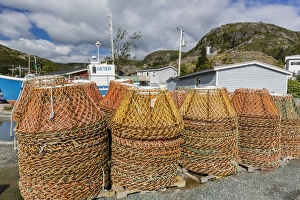 Lobster Pot Prints: Lobster traps near fishing boat outside St. Johns, Newfoundland, Canada, North America