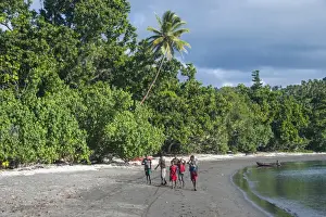 10 11 Years Prints: Local boys walking on a pretty black sand volcanic beach, Epi Island, Shepherd Islands