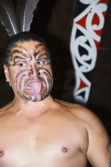 One Man Only Prints: Local Maori man with traditional Moko face tattoo painting