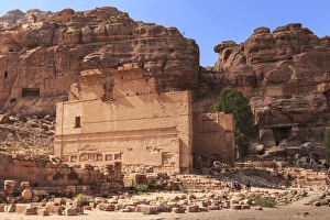 Ancient City Prints: Local men on donkeys pass Qasr al-Bint temple, City of Petra ruins, Petra, UNESCO