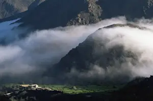 High Atlas Prints: Local school below mist rising in valley of the High Atlas mountains