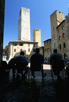San Gimignano Prints: Locals enjoying the shade in the Piazza del Duomo