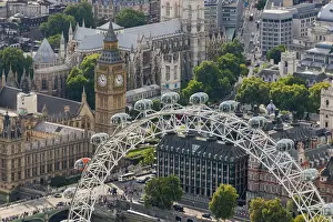 Ferris Wheel Prints: The London Eye and Jubilee Gardens with the Houses of Parliament in the distance, London