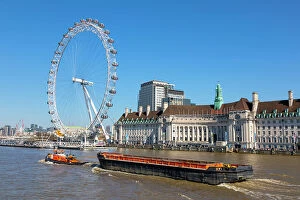 Ferris Wheel Collection: London Eye, tug boat and barge, River Thames, London, England, United Kingdom, Europe