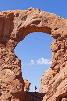 50 54 Years Prints: Lone hiker in Turret Arch, Arches National Park