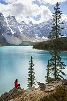 Contemplating Gallery: Lone traveller at Moraine Lake and the Valley of the Ten Peaks, Banff National Park