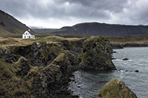 Sea Stack Gallery: Lone white house among the sea stacks and moutains at Arnastapi, Snaefellsnes Peninsula