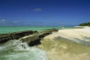 Lonely figure on beach, Maninita Island, Vava u Group, Tonga, Pacific Islands