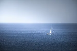 Sailboat Prints: Lonely sail boat in the sea, Antiparos Island, Cyclades, Greek Islands, Greece, Europe